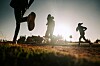 Runners jog at dawn. Pic: Kovop/Shutterstock