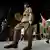 Visitors in Japanese Imperial army costume entering the Yasukuni Shrine in 2023