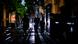 People walk down the street between flashlights and light reflections during the power outage that affects Spain on April 28, 2025 People walk down the street between flashlights and light reflections during the power outage that affects Spain on April 28, 2025