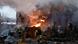 A firefighter works at the site of a residential building damaged during Russian drone and missile strikes A firefighter works at the site of a residential building damaged during Russian drone and missile strikes
